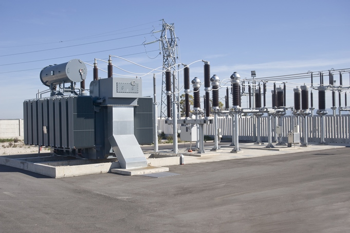 An electric substation converting power from the power plant to commercial and private use.