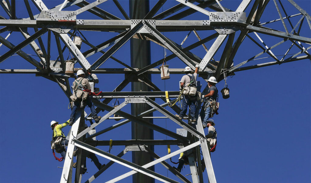 Men working on a substation performing the Cache Valleye Electric industrial electrical services